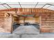 Spacious garage with wooden frame and concrete floor, perfect for storage at 2731 State Road 557, Lake Alfred, FL 33850