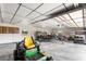 Bright and spacious garage with room for vehicles and outdoor gear at 2731 State Road 557, Lake Alfred, FL 33850