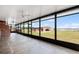 Spacious screened patio boasts scenic views, tiled flooring and a lovely outdoor atmosphere at 2731 State Road 557, Lake Alfred, FL 33850