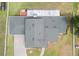 Aerial view of a large home with a well-maintained roof and spacious layout at 2731 State Road 557, Lake Alfred, FL 33850