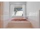 A bathroom featuring a pink bathtub at 2987 Plantation Rd, Winter Haven, FL 33884