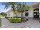 Inviting front porch with meticulous landscaping and charming curb appeal at 2987 Plantation Rd, Winter Haven, FL 33884