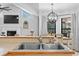 Modern kitchen sink area with stainless steel sink, faucet, and counter space at 2987 Plantation Rd, Winter Haven, FL 33884