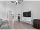 Cozy living room with modern furniture, hardwood floors, and an open layout at 2987 Plantation Rd, Winter Haven, FL 33884