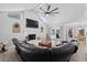 Bright living room with vaulted ceilings, fireplace, and access to backyard at 2987 Plantation Rd, Winter Haven, FL 33884