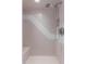 A shower tiled with pink and white tiles at 2987 Plantation Rd, Winter Haven, FL 33884