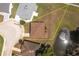 An aerial view highlights the property's generous lot and serene pond-side location within the community at 3245 Prairie Dunes E Cir, Lakeland, FL 33810