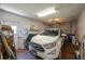 Attached garage offering ample space for parking a vehicle and storage at 3245 Prairie Dunes E Cir, Lakeland, FL 33810