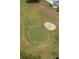 Golf course green with manicured sand trap and flag at 3245 Prairie Dunes E Cir, Lakeland, FL 33810