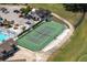 An overhead view of the well-maintained community tennis courts, adjacent to the clubhouse at 3245 Prairie Dunes E Cir, Lakeland, FL 33810