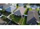Aerial view of the house showing backyard landscaping, patio, and fenced yard at 3828 Eloise Estates Ct, Winter Haven, FL 33881