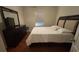 Bedroom with a queen-sized bed, a dresser, and a window at 3828 Eloise Estates Ct, Winter Haven, FL 33881