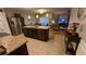 Spacious kitchen with stainless steel appliances and an island with granite countertops at 3828 Eloise Estates Ct, Winter Haven, FL 33881