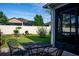 Outdoor patio with table, chairs, and view of the fenced backyard at 3828 Eloise Estates Ct, Winter Haven, FL 33881