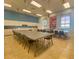 Versatile activity room with tables, chairs, and cabinets for crafts, meetings, and group activities at 4004 Sable Loop Dr, Lake Wales, FL 33859