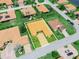 An aerial view of a property highlighting landscaping and neighborhood at 4004 Sable Loop Dr, Lake Wales, FL 33859