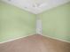 An empty bedroom featuring neutral tile flooring and a ceiling fan at 4004 Sable Loop Dr, Lake Wales, FL 33859