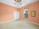 Bright bedroom with tile flooring, a ceiling fan, and a window at 4004 Sable Loop Dr, Lake Wales, FL 33859