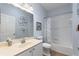 Bathroom with a single sink vanity, decorative mirror and framed art at 4175 Muirfield Loop, Lake Wales, FL 33859