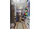 Organized walk-in closet with custom shelving and ample storage space at 4175 Muirfield Loop, Lake Wales, FL 33859