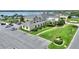 Aerial view of clubhouse with parking at 4175 Muirfield Loop, Lake Wales, FL 33859