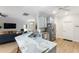 Kitchen showcasing granite countertops, stainless steel appliances, and eat-in bar at 4175 Muirfield Loop, Lake Wales, FL 33859