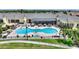 Aerial view of clubhouse pool at 4175 Muirfield Loop, Lake Wales, FL 33859