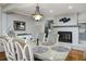 Well-lit dining room with a view, hardwood floors, and an open layout at 418 North Rd, Lakeland, FL 33809
