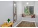 Charming window nook with a built-in bench, decorative pillows, and bright natural light at 418 North Rd, Lakeland, FL 33809
