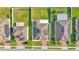Bird's-eye view of a residential neighborhood showcasing the home's location, solar panels, and landscaped surroundings at 428 Aragosa Dr, Davenport, FL 33837