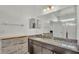 Bathroom boasts granite countertops, modern fixtures and ample storage space at 428 Aragosa Dr, Davenport, FL 33837