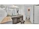 Bathroom vanity with granite countertop and well-lit mirror and modern fixtures at 428 Aragosa Dr, Davenport, FL 33837