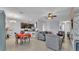 Open concept living and dining area; great for entertaining with lots of space and natural light at 428 Aragosa Dr, Davenport, FL 33837