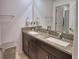Bathroom with granite countertops and double sinks, offering plenty of space at 4400 Trotters Way, Lakeland, FL 33801