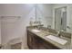 Bathroom with granite countertops and double sinks, offering plenty of space at 4400 Trotters Way, Lakeland, FL 33801