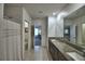 This bathroom features granite countertops, double sinks, and shower at 4400 Trotters Way, Lakeland, FL 33801
