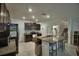Spacious kitchen with granite countertops and stainless steel appliances at 4400 Trotters Way, Lakeland, FL 33801