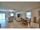 Bright living room with dining area, lots of natural light, and access to a patio at 4400 Trotters Way, Lakeland, FL 33801