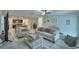 Cozy living room connected to the kitchen, perfect for modern living and socializing at 4400 Trotters Way, Lakeland, FL 33801