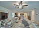 Inviting living room open to the kitchen, creating a seamless flow for entertaining and relaxation at 4400 Trotters Way, Lakeland, FL 33801