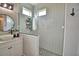 Bathroom featuring a modern glass shower and stylish vanity with sink at 445 Waterfern Trail Dr, Auburndale, FL 33823