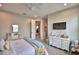 Bright bedroom boasts natural light and a comfortable vanity area at 445 Waterfern Trail Dr, Auburndale, FL 33823