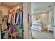 Open closet with rods and shelving shown from the doorway of the bedroom at 445 Waterfern Trail Dr, Auburndale, FL 33823