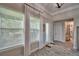 Entryway features hardwood floors, natural lighting and white molding at 445 Waterfern Trail Dr, Auburndale, FL 33823