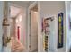 Hallway view of an ensuite bathroom featuring a standing shower at 445 Waterfern Trail Dr, Auburndale, FL 33823