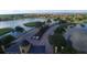 Aerial shot capturing the community entrance, showcasing lush landscaping, serene lakes, and the overall neighborhood layout at 4488 Turnberry Ln, Lake Wales, FL 33859