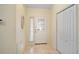 Bright entryway with tile flooring and ample closet space at 469 Sweetwater Way, Haines City, FL 33844