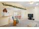 View of the living room, dining area, and breakfast bar at 469 Sweetwater Way, Haines City, FL 33844