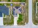 Aerial view shows solar panels installed on a home's roof, enhancing energy efficiency at 47 Willow Ln, Kissimmee, FL 34759