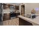 Well-lit kitchen featuring modern appliances, ample counter space, and stylish decorative touches at 47 Willow Ln, Kissimmee, FL 34759